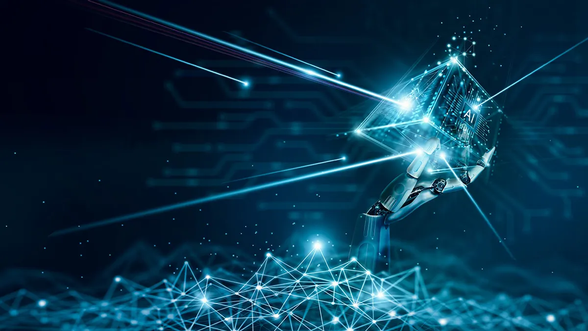 A robotic hand reaches through glowing blue digital data streams, holding a cube labeled "AI," symbolizing advanced technology and artificial intelligence innovation.