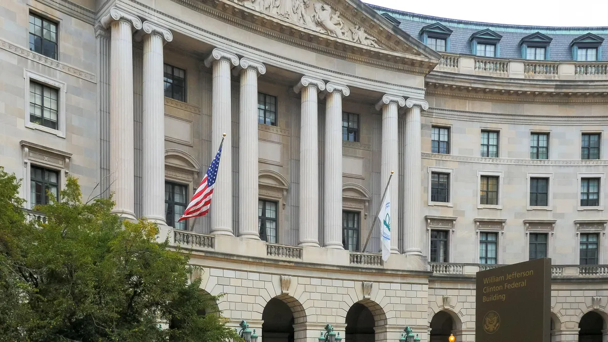 The exterior view of the U.S. Environmental Protection Agency showcases its neoclassical architectural style with limestone façade, tall arched windows, and decorative columns.​