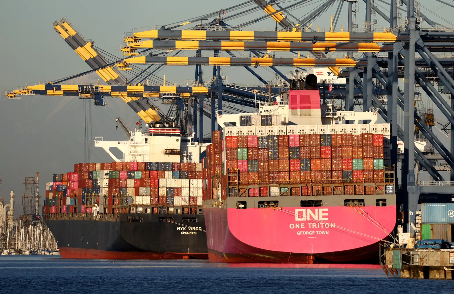 Container ships are docked with shipping containers at the Port of Los Angeles.