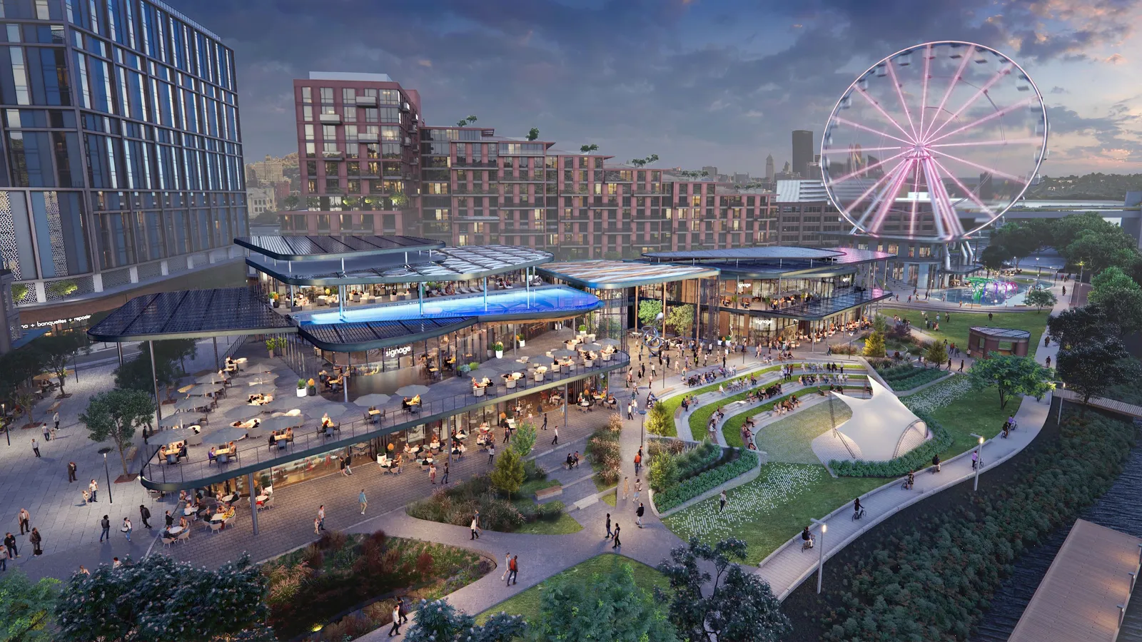 A massive complex with bright buildings and a Ferris wheel sit along a river bed at night.