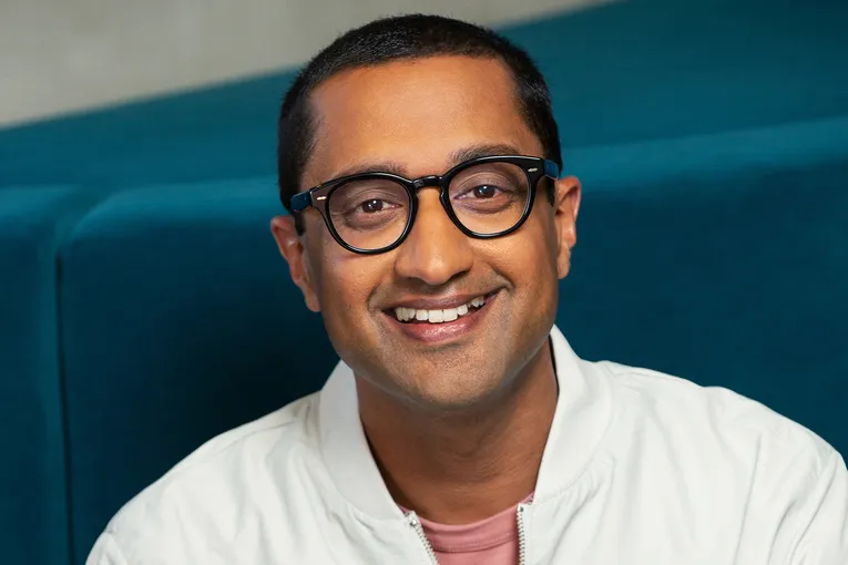 Chili&#x27;s CMO George Felix wears glasses and a white shirt