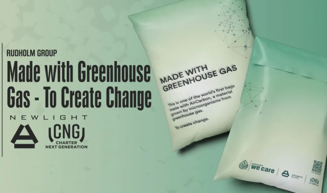 Two poly mailer bags for e-commerce shipments with text that says they&#x27;re made with greenhouse gases.