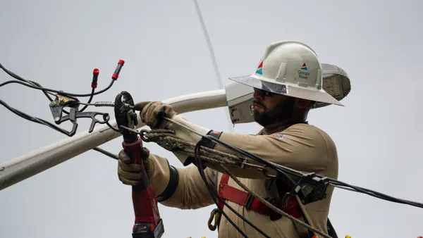 Power line crews come out to help people who are experiencing difficulty with their power in Savannah, Georgia.