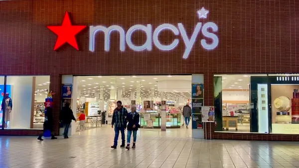 People walking around a mall.