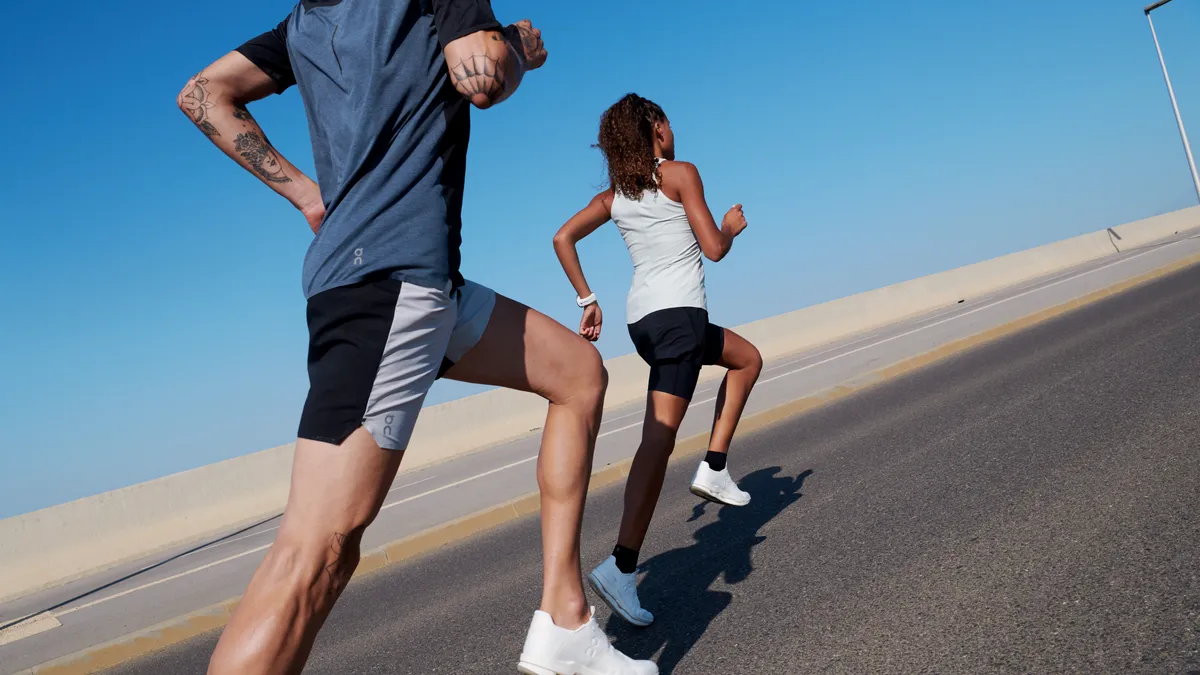 Two people running in On Cloudneo shoes