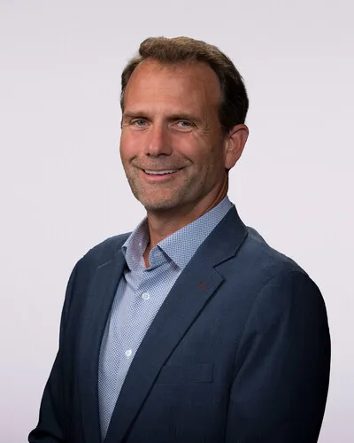 A headshot of Keith Cleason, president of Dow&#x27;s packaging and specialty plastics business unit.