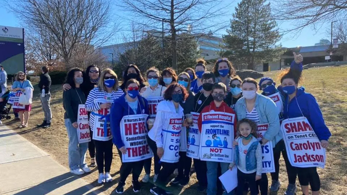 Nurses picket outside Tenet's St. Vincent Hospital in Worcester, Massachusetts