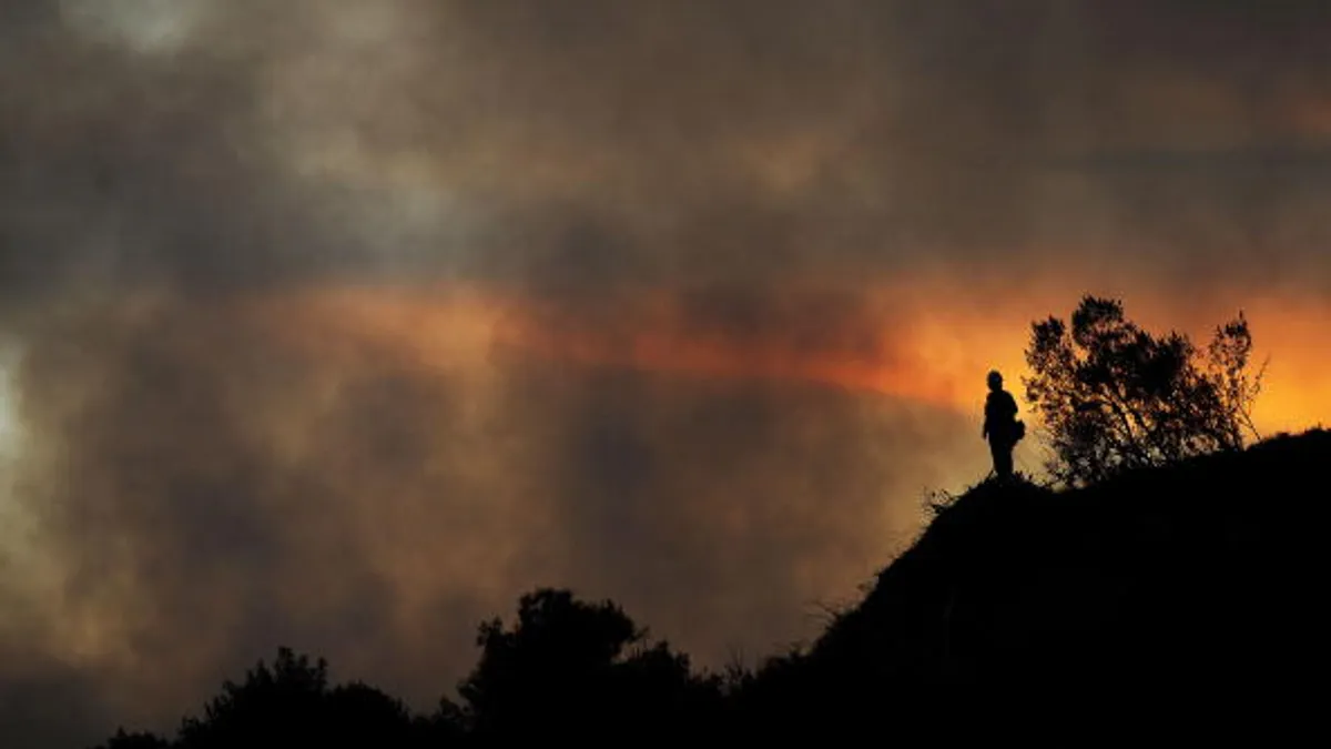 U.S. Forest Service firefighters battle the Angeles Crest Station Fire.