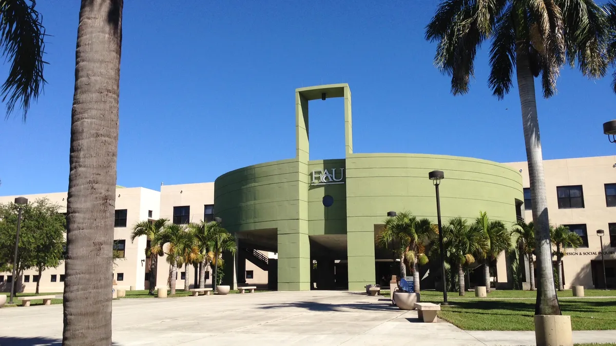 An academic building at Florida Atlantic University, with the letters FAU on it.