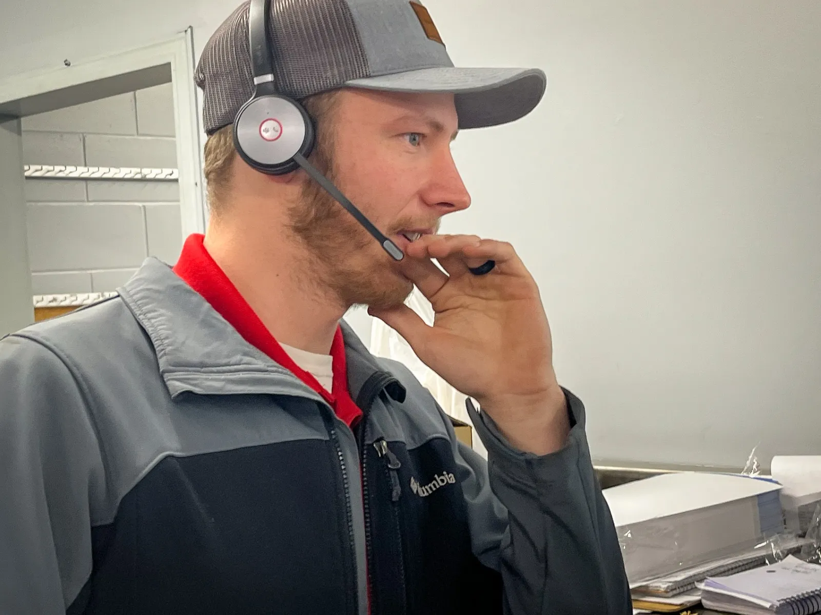 A Palmer Trucks staffer uses a headset to communicate.