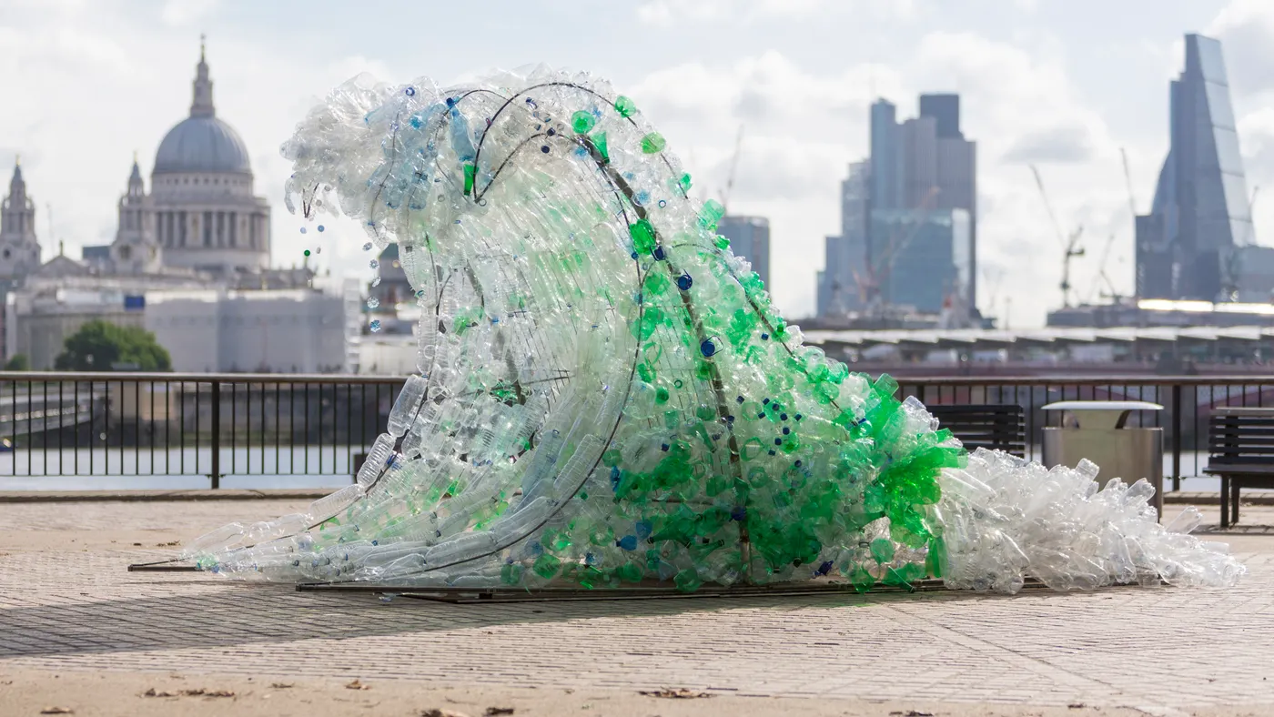 A wave sculpture created of plastic bottles