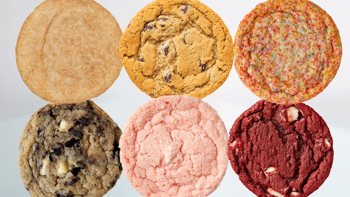 An image of six cookies of different colors and flavors in front of a white background.