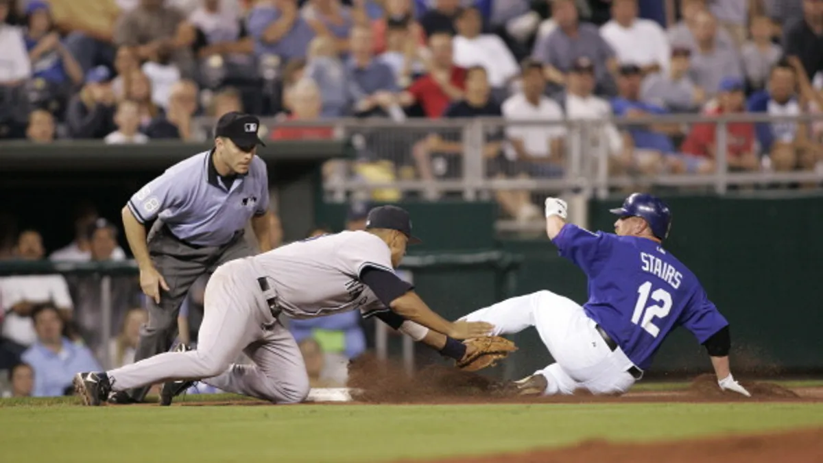 Alex Rodriguez of the New York Yankees tags out Matt Stairs during a game against the Kansas City Royals at Kauffman Stadium in Kansas City, Mo. The Royals won the game 5-3.