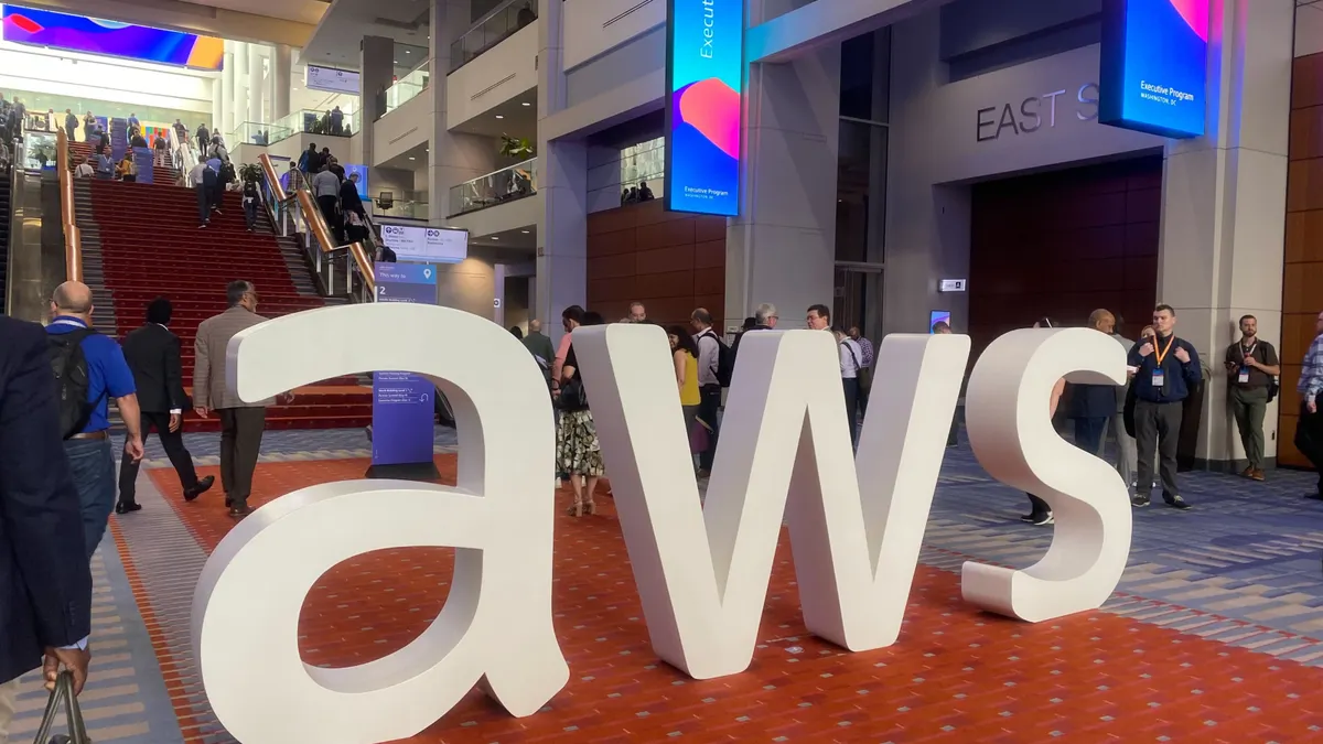 Attendees walk around the Walter E. Washington Convention Center in Washington, D.C during an AWS Summit on June 10, 2025.