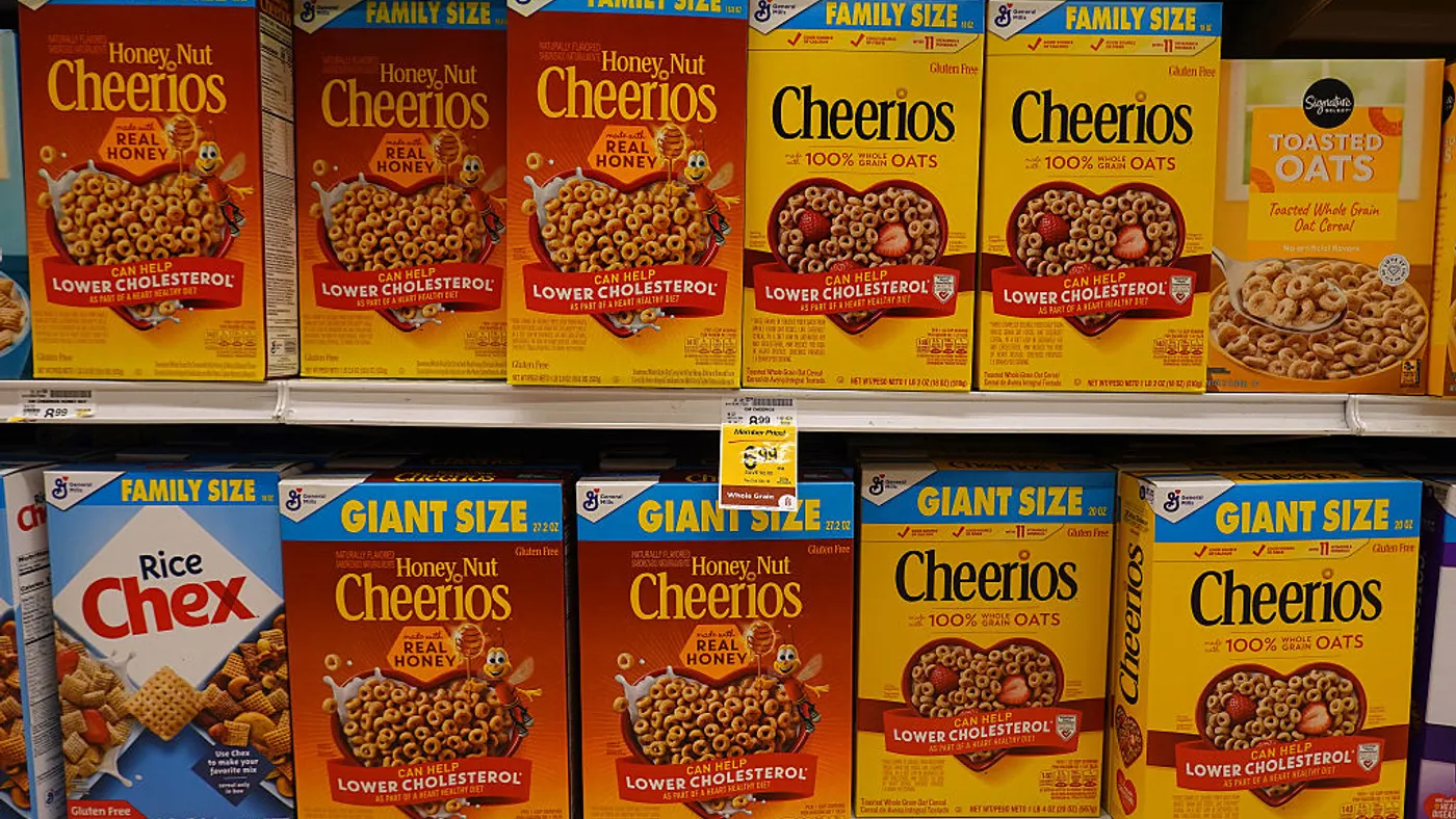 Boxes of Cheerios displayed on a store shel
