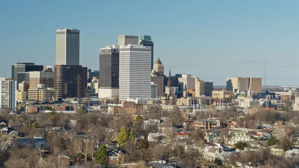 A skyline view of skyscraper buildings on a clear day.
