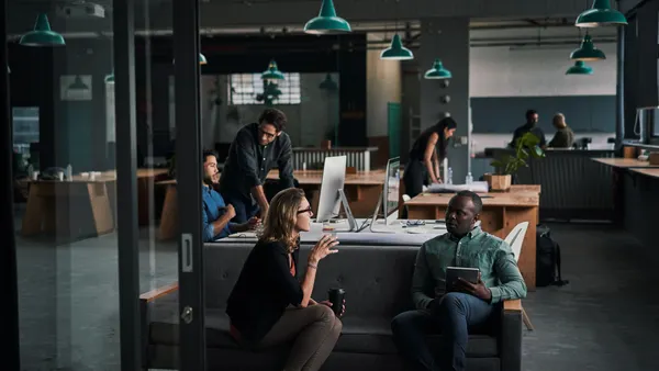 Businesspeople in a modern office.