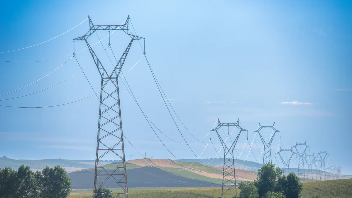 High voltage power lines from a solar thermal plant in Sanlúcar la Mayor, Sevilla, Andalucía, España.