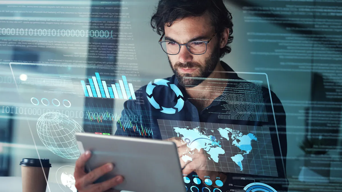 Man working while wearing glasses