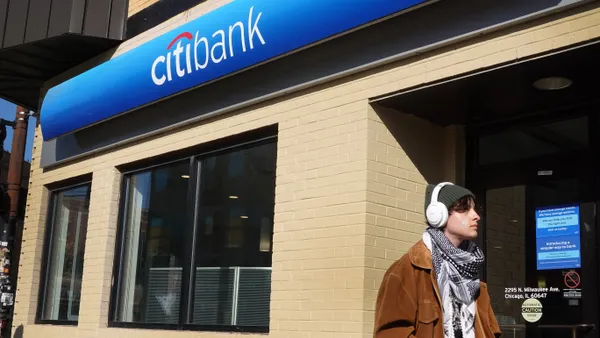 A pedestrian walks past a Citibank branch on November 15, 2023 in Chicago, Illinois.