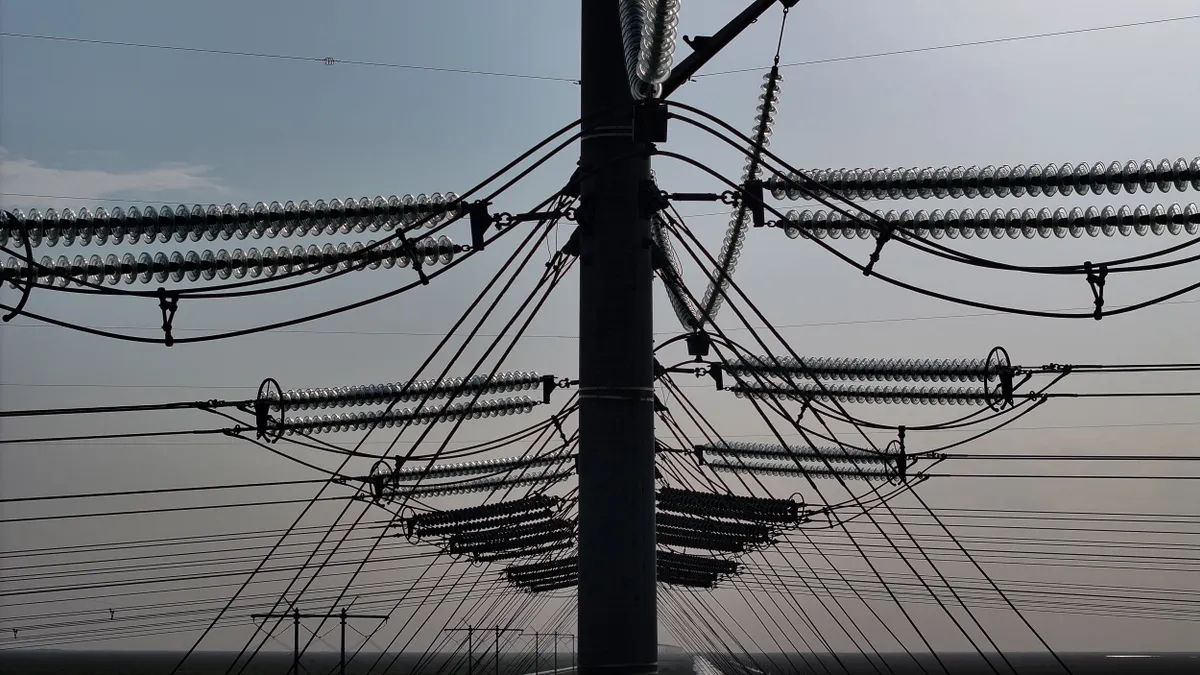 An aerial view of high voltage power lines.