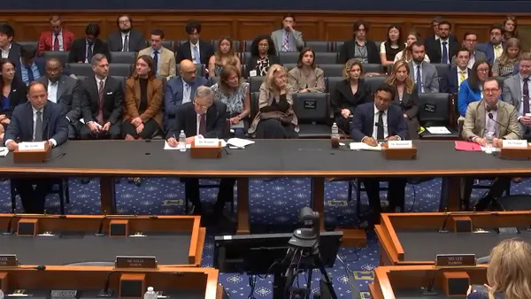 A group of four people sit at a table during a House Subcommittee on Commerce, Manufacturing and Trade hearing on April 15, 2026.