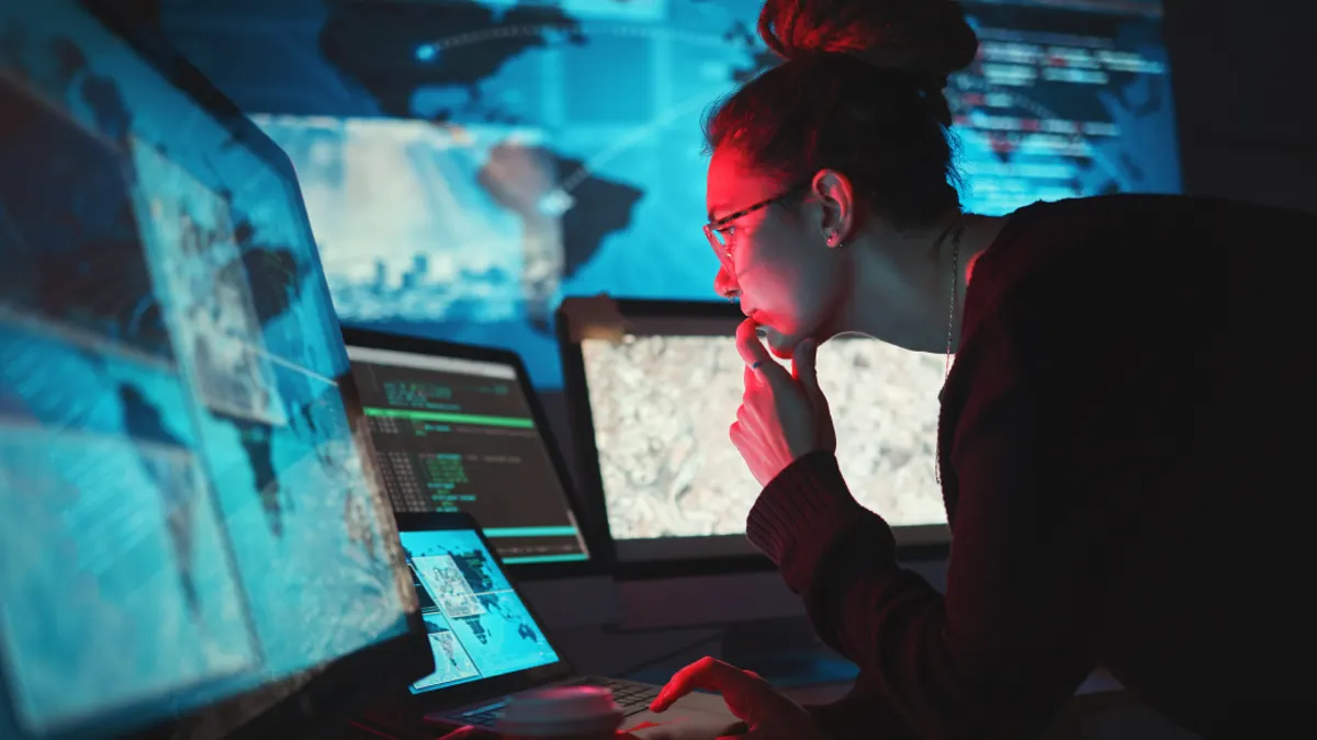 Cybersecurity, woman and computer with global network for phishing, ransomware and cyber search.