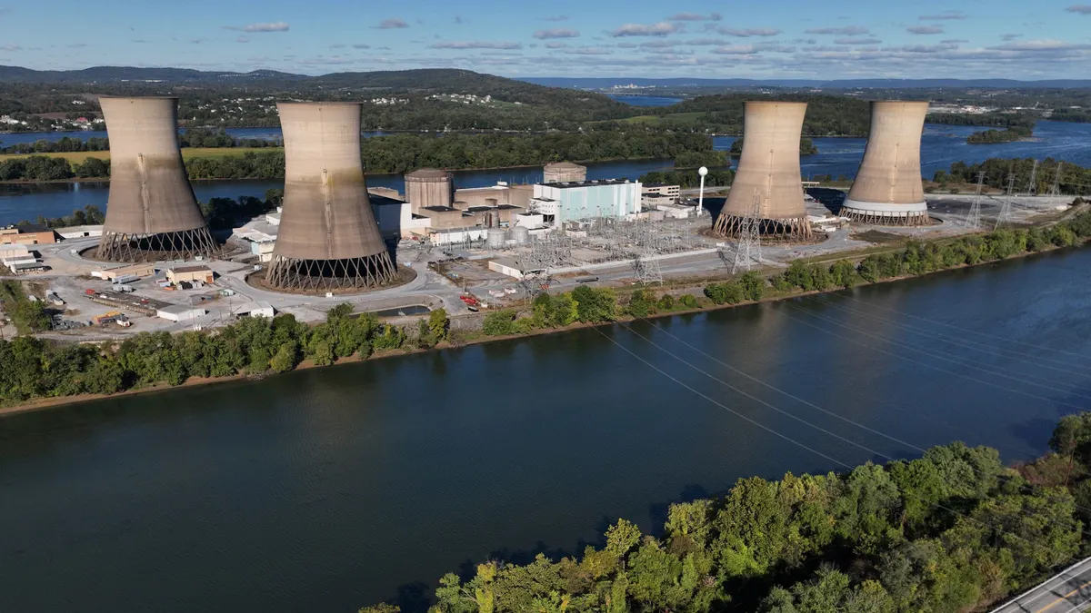A nuclear power plant alongside a river.