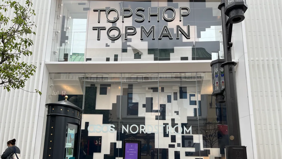 A Topshop Topman storefront advertising the Asos and Nordstrom logos.