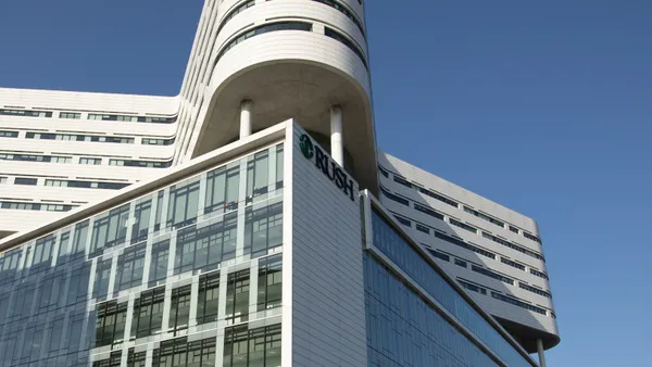 A hospital building with "Rush" on the side.