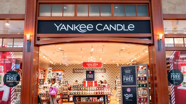 Customers shop at a Yankee Candle store
