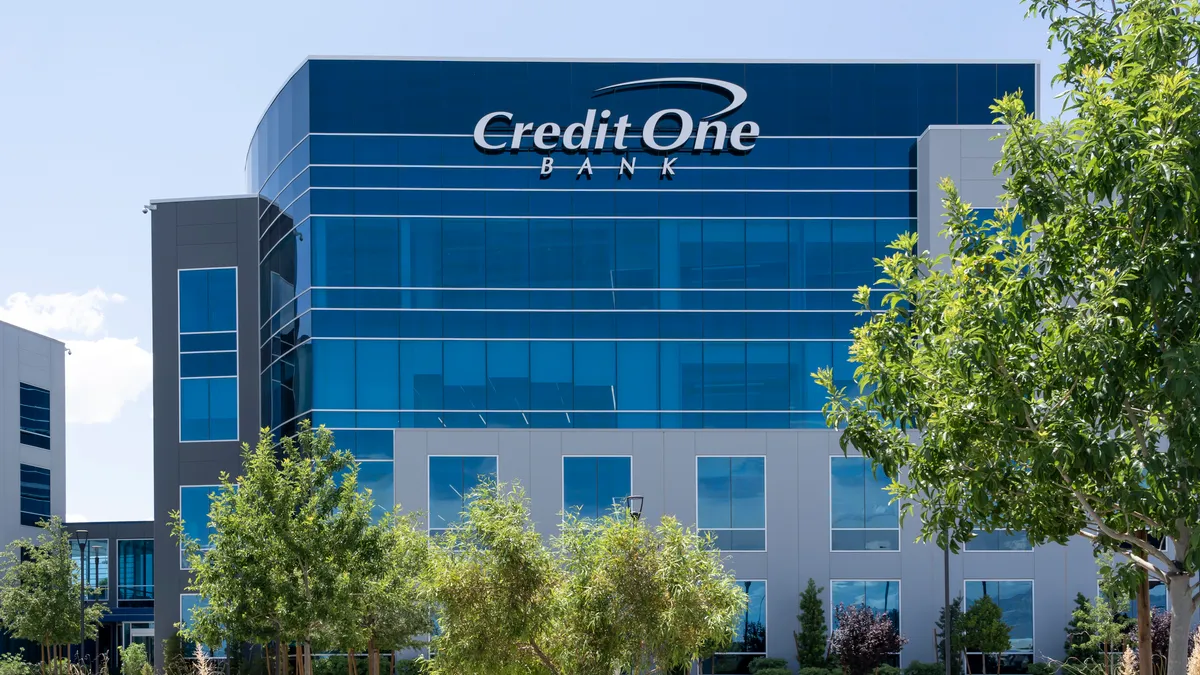 The Credit One Bank logo is displayed on the company's headquarters building.