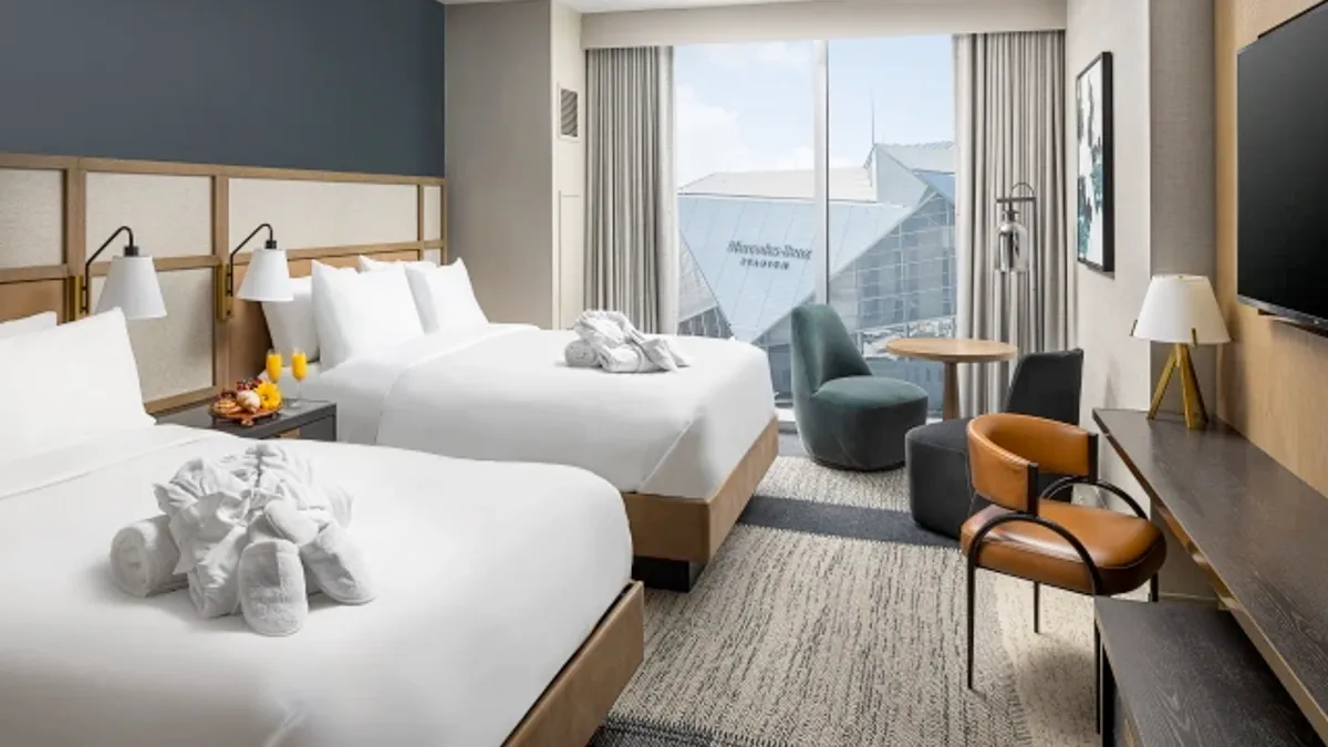 A rendering of a hotel room