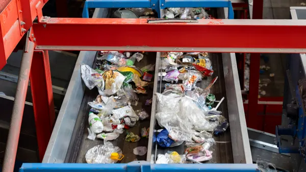 Discarded items on a recycling belt