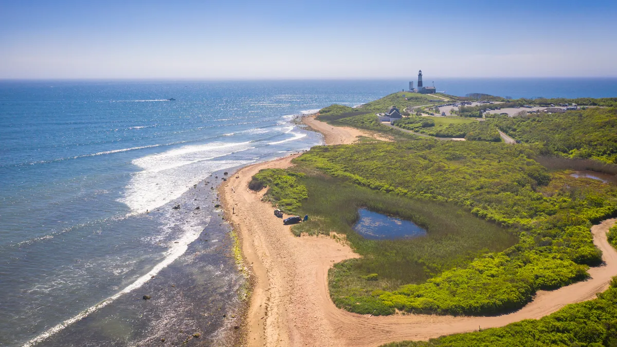 Aerial view of lighthouse along beach