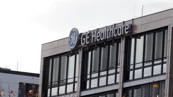 An office building says "GE Healthcare" on the side.