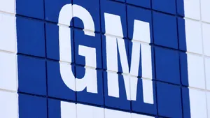 A blue sign with white lettering reads "GM."