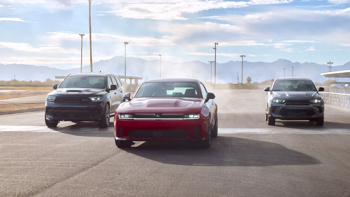 Sporty versions of the Dodge Durango, Dodge Charger, and Dodge Hornet together on the track