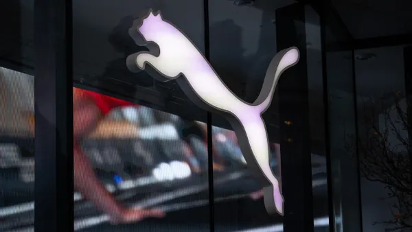 People pass a Puma store on December 9, 2025 in London, Englan