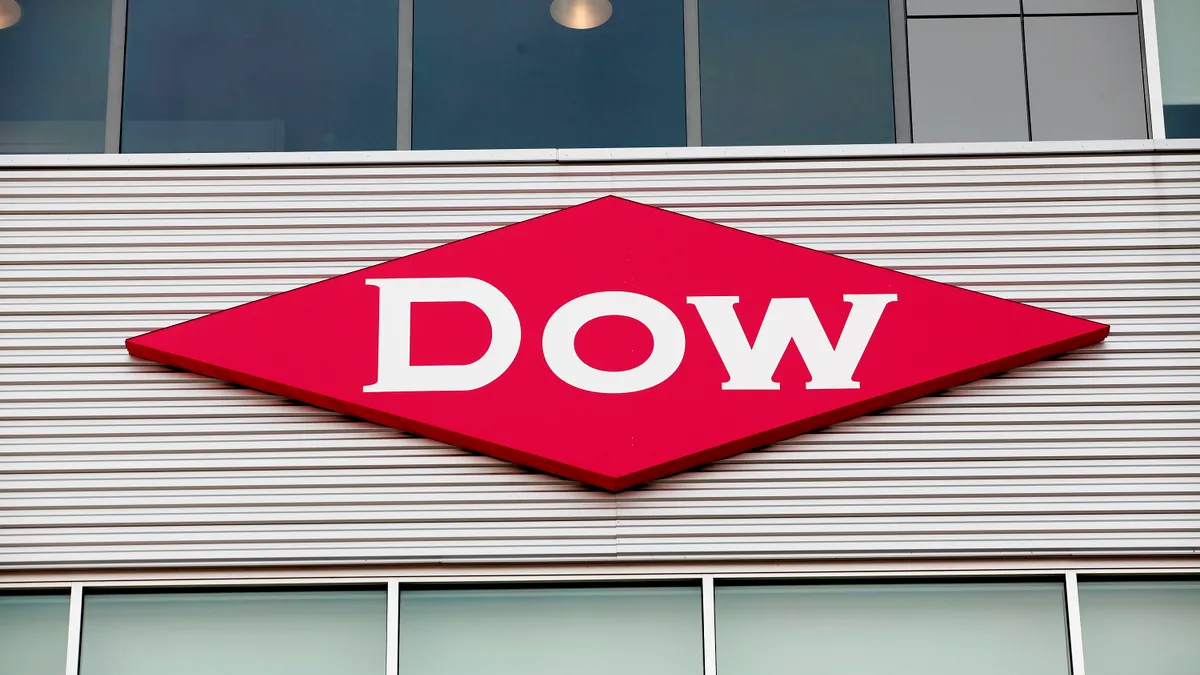 The Dow Chemical logo is shown on a building in downtown Midland, home of the Dow Chemical Company corporate headquarters, on Dec. 10, 2015, in Midland, Michigan.