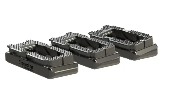 Three gray, rectangular devices are pictured next to each other.