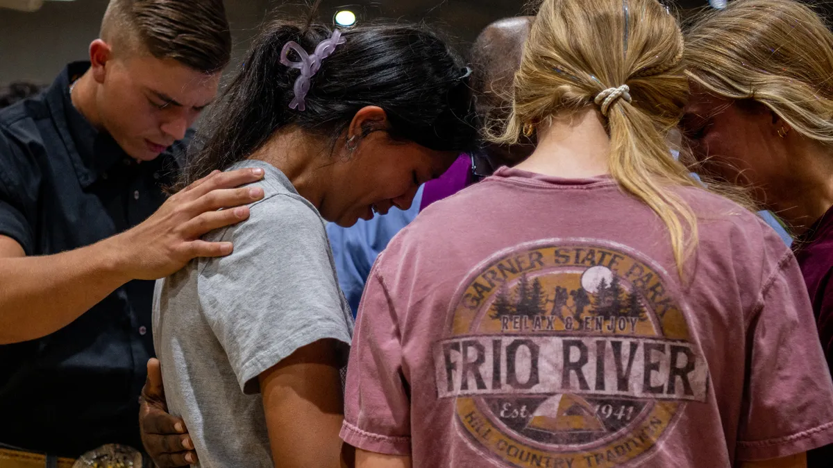 Community members grieve after a shooting in Uvalde, Texas leaves 19 children and 2 adults dead.