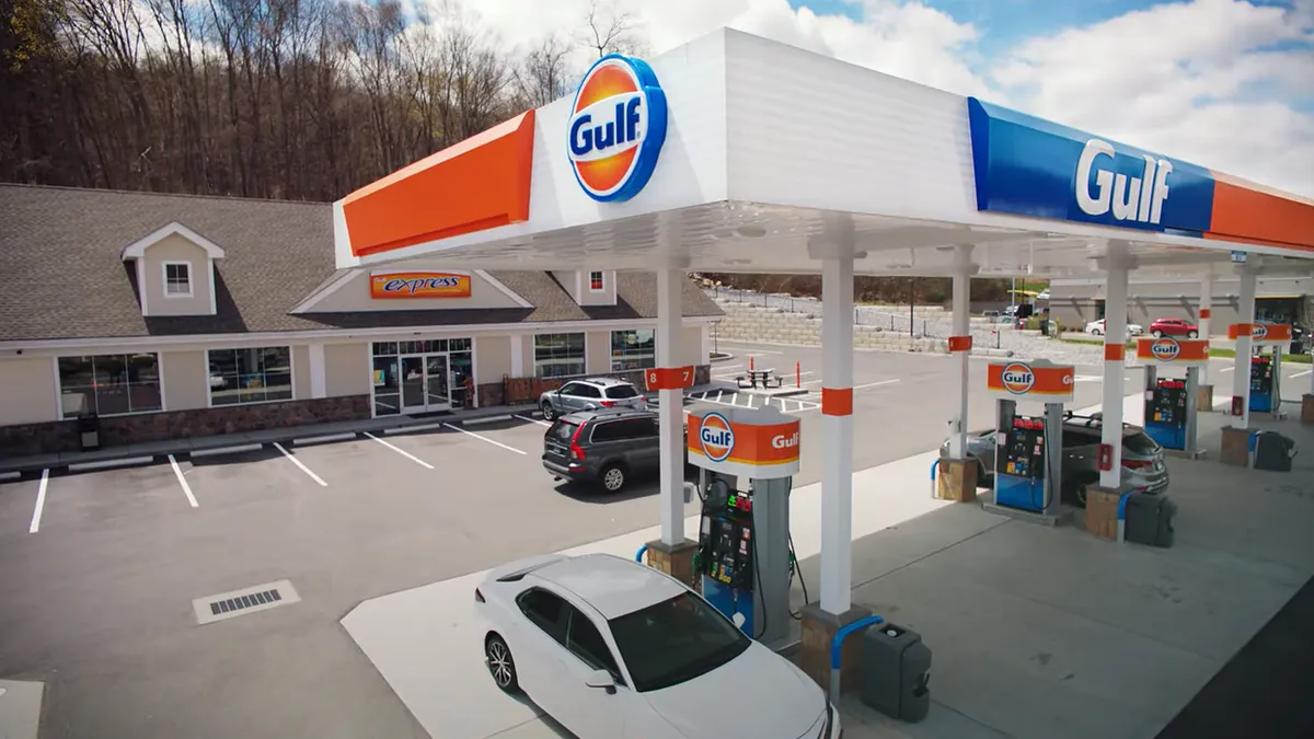 Screenshot showing the exterior of a Gulf-branded fueling station