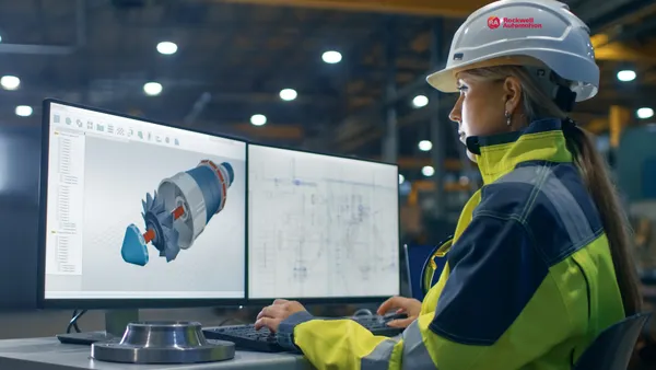 ndustry Factory Female Industrial Engineer Works on the Personal Computer on the Turbine/ Engine Project in 3D Using CAD Program.