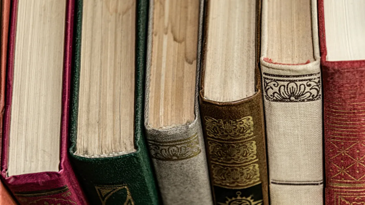 Stack of old books with leather covers