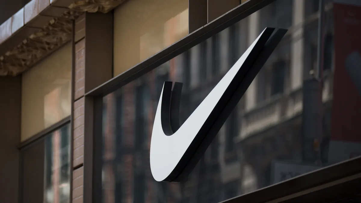 The Nike swoosh logo is pictured up close.