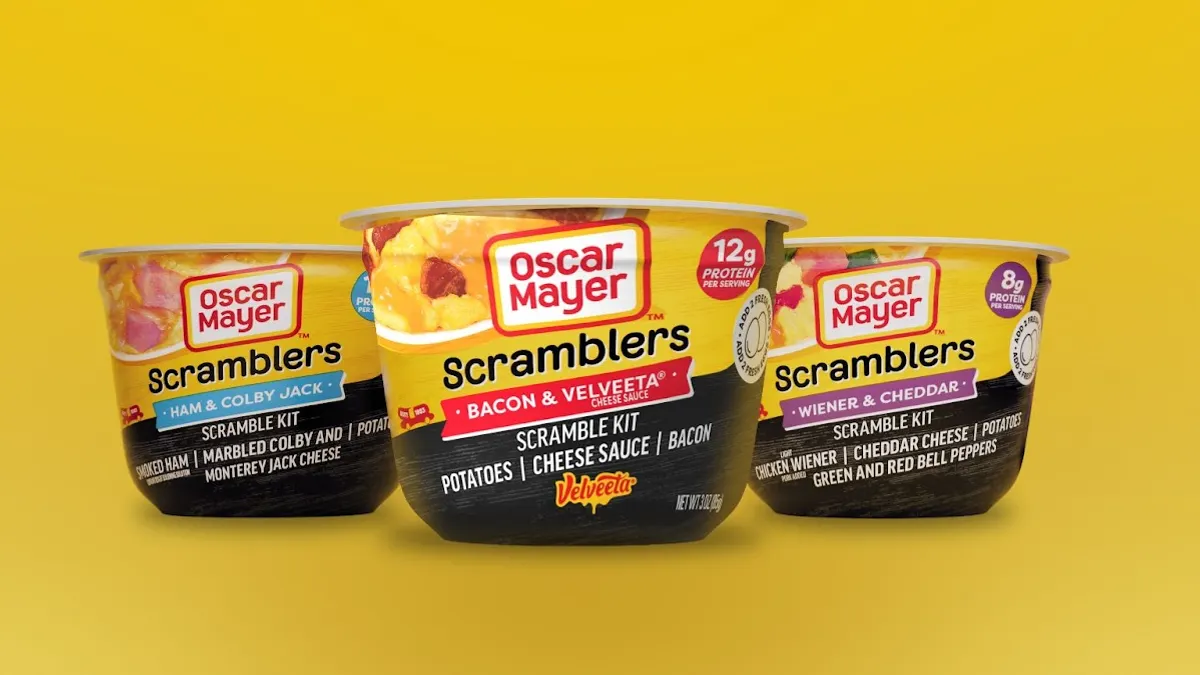 Three Oscar Mayer Scramblers against a yellow background.