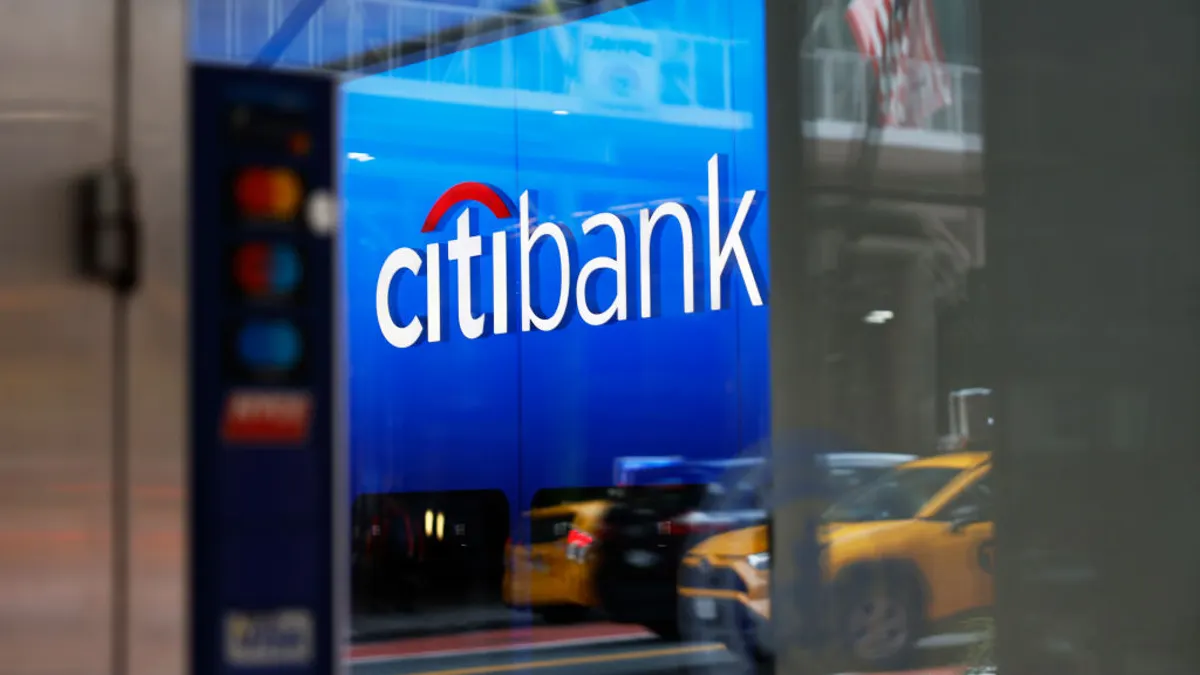 A closeup of Citi signage on a city storefront