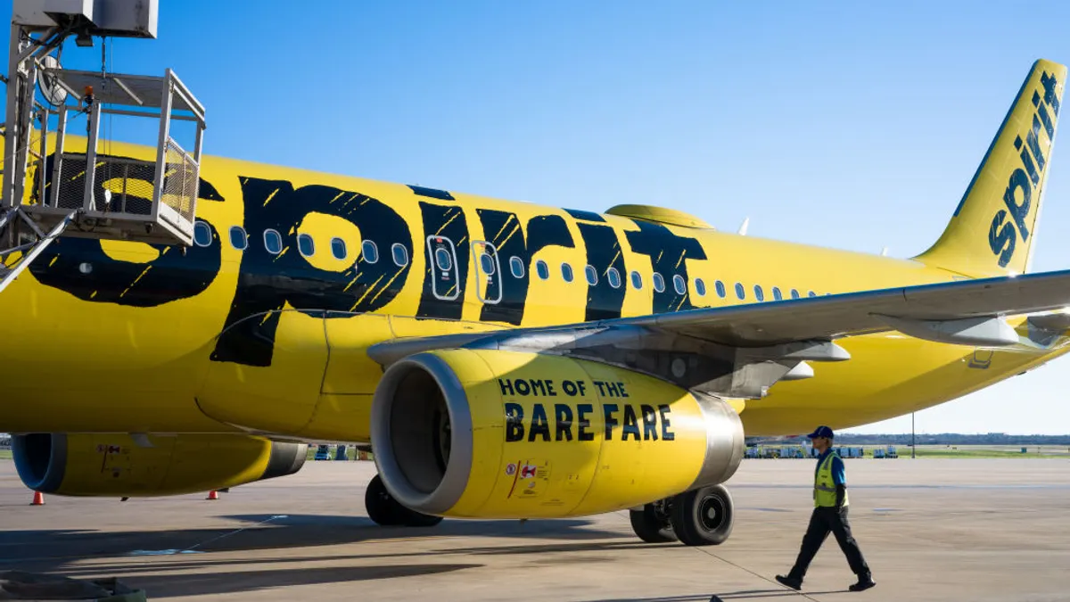 A Spirit Airlines aircraft undergoes operations in preparation for departure at the Austin-Bergstrom International Airport on February 12, 2024 in Austin, Texas.
