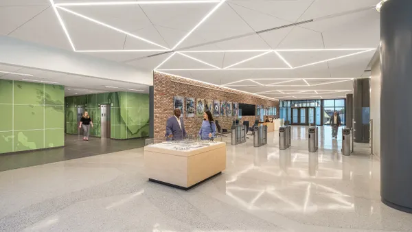 An interior shot of a modern waiting and lobby area with a good amount of natural light.